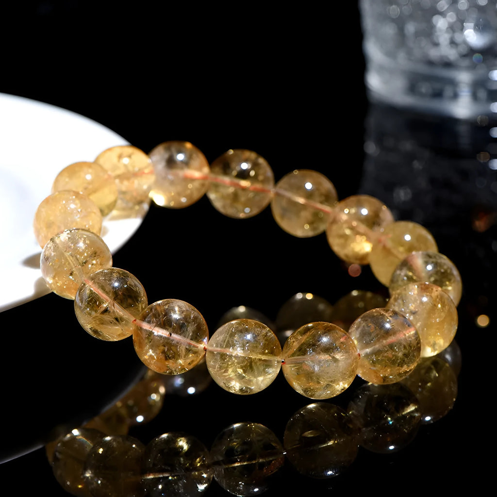 Natural yellow citrine gemstone bracelet in Asestelle design, showing single and multiple strand options.