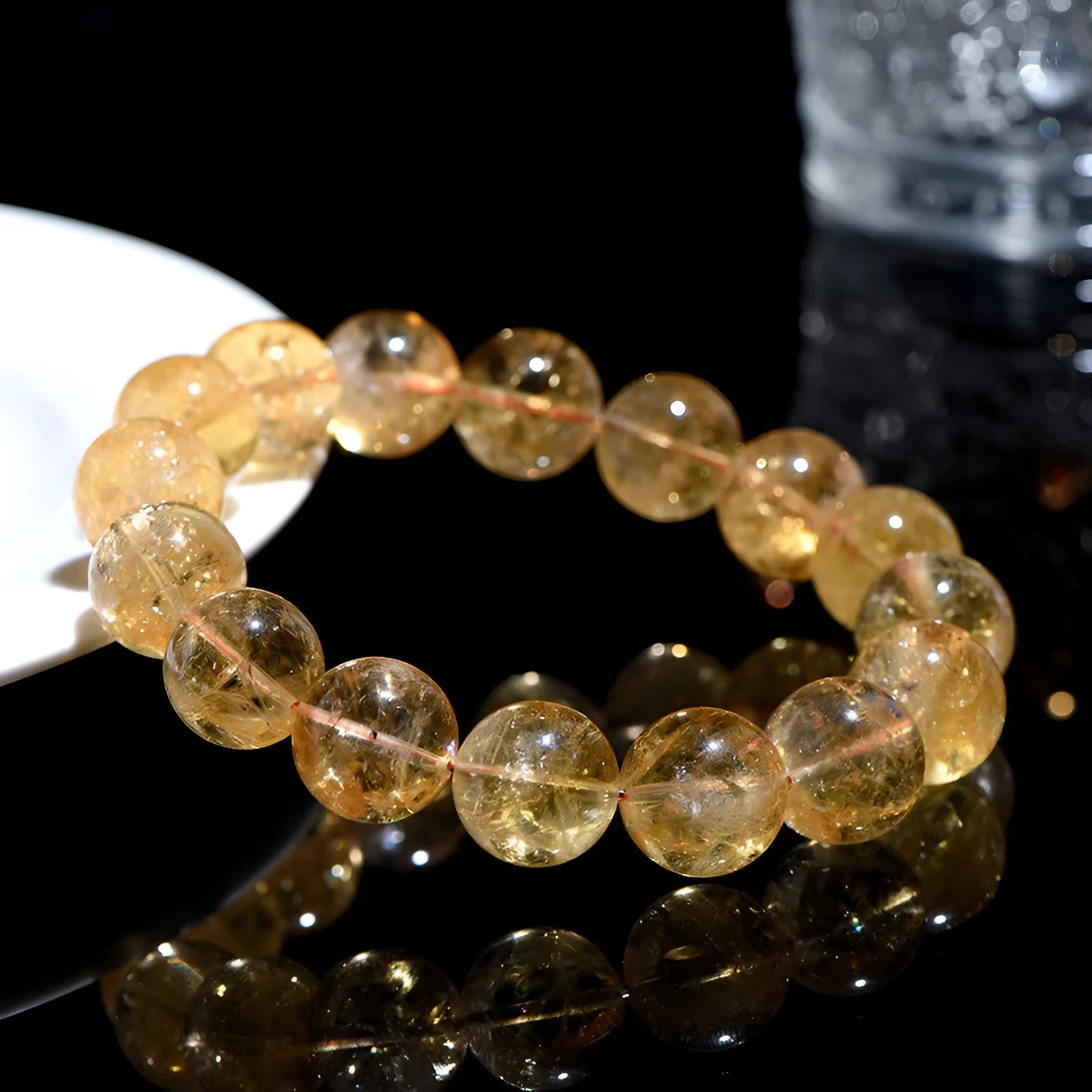 Natural yellow citrine gemstone bracelet in Asestelle design, showing single and multiple strand options.