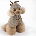 Camel-coloured cotton cloak pet clothes with an adjustable hat, shown on a mannequin.