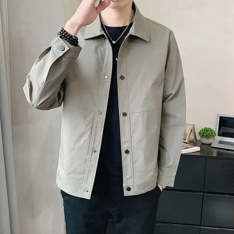 Men's thin single-layer Korean style jacket in a neutral colour on a hanger.