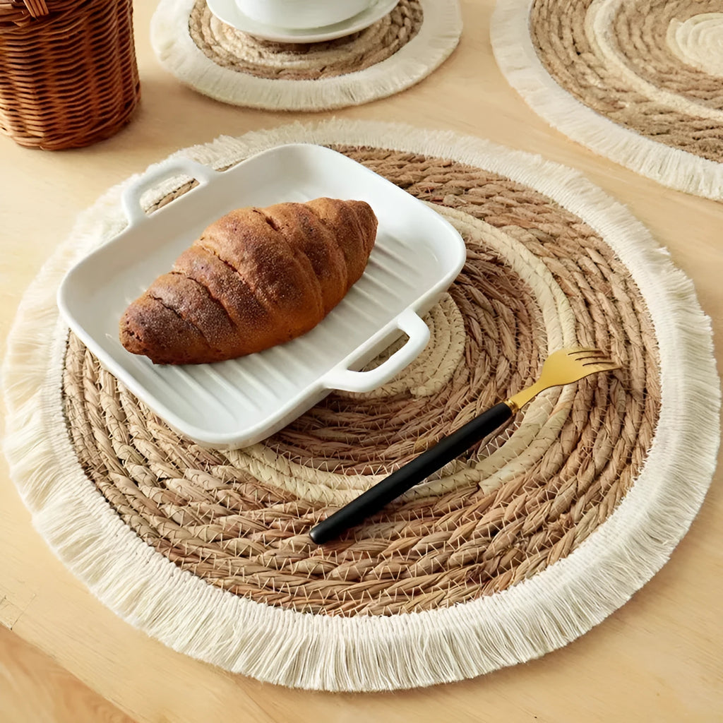 Round Japanese straw placemat with natural papyrus weave and tassel detailing in corn rope or plain style