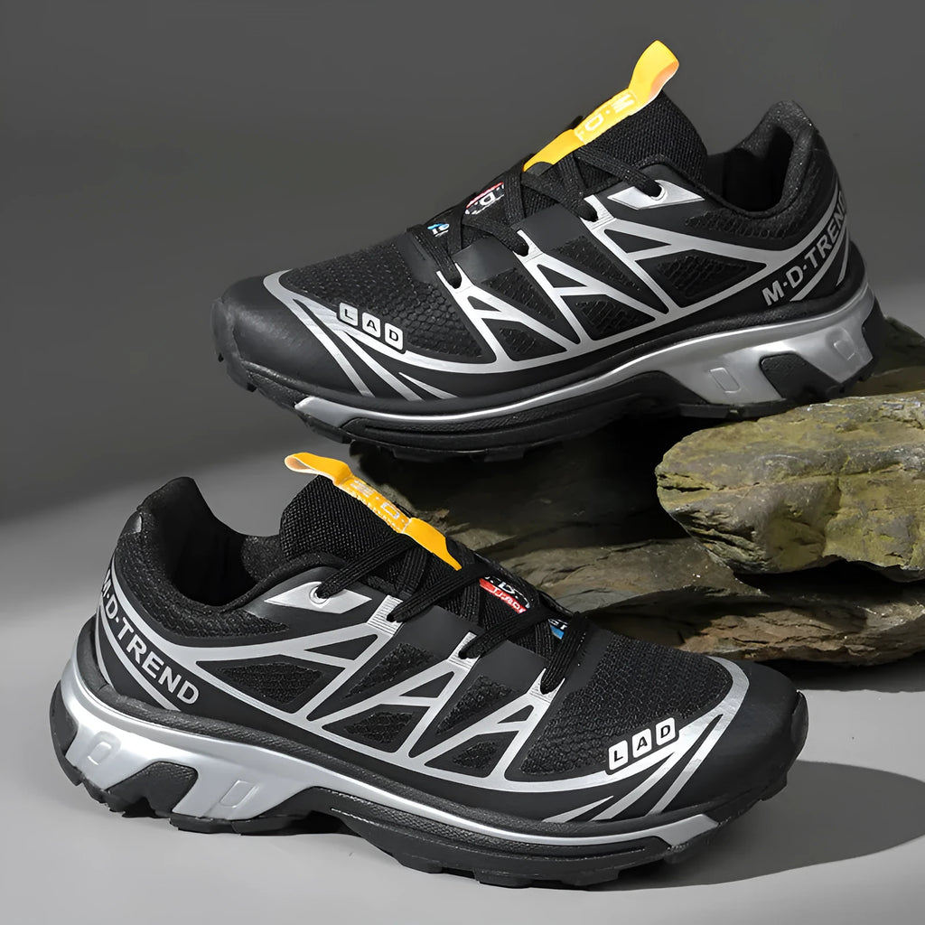 Men's and women's low-top outdoor hiking shoes in a casual sports style with lace-up front.