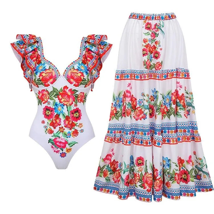 Women's printed one-piece polyester swimsuit on a hanger, showing rose pink, white, blue, and red apron design options.