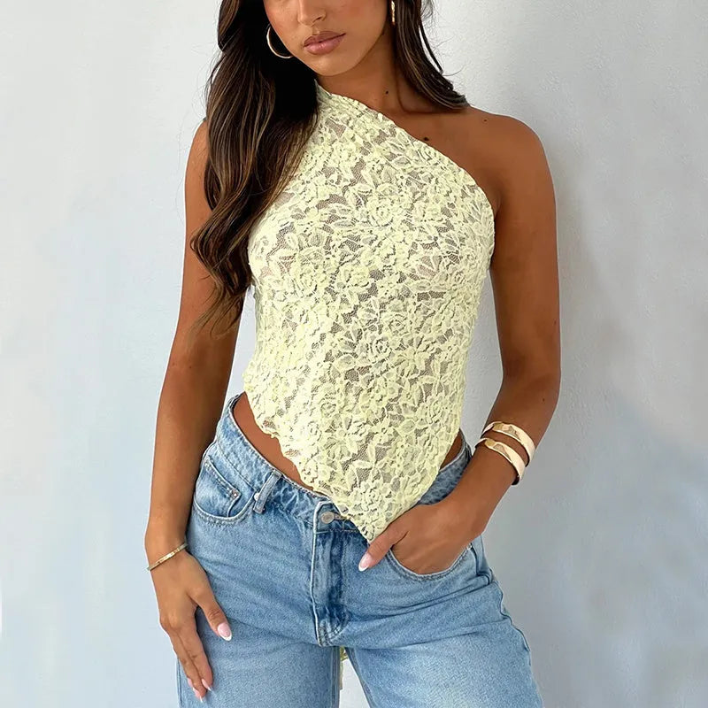 Women's apricot lace backless sleeveless vest top with an asymmetrical neckline on a model.