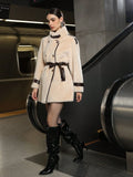 Women's loose fit apricot faux fur coat with lace-up front and faux fur collar