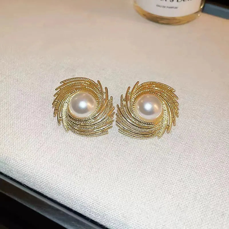 Women's vintage pearl earrings with exaggerated flower shape and electroplated alloy construction