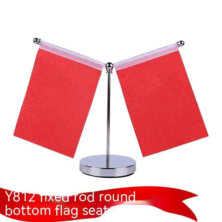 Adjustable metal telescopic rod decoration with a coloured polyester flag on a stand, shown on a car dashboard.
