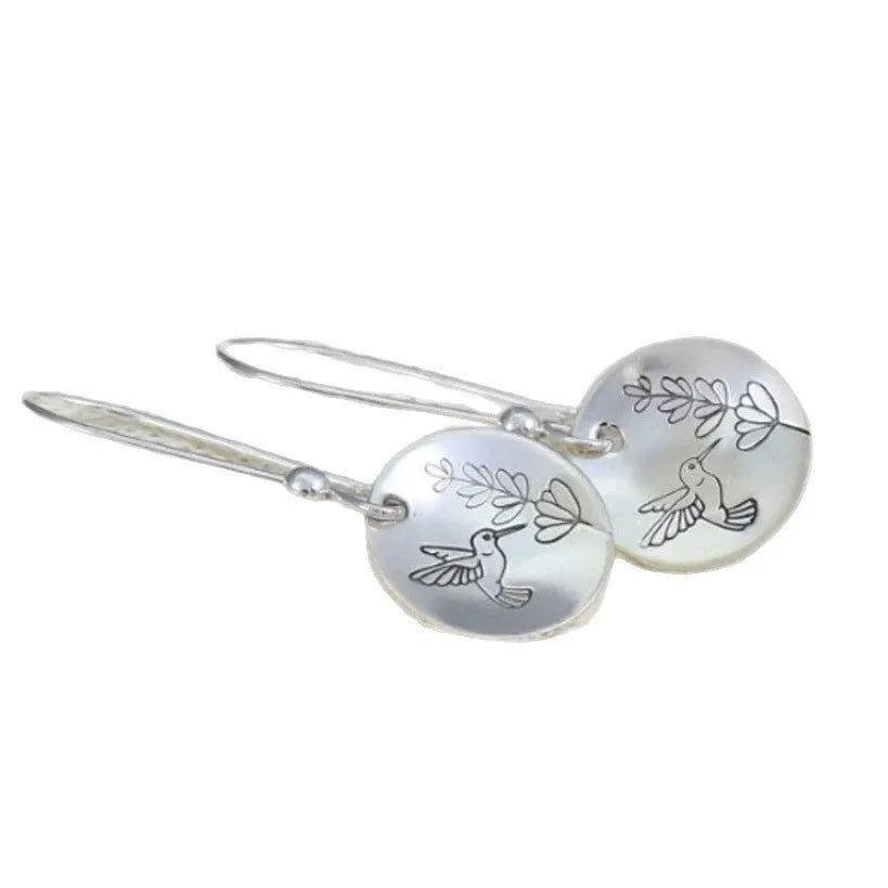 Silver retro bird flower glossy round women's earrings made from zinc alloy