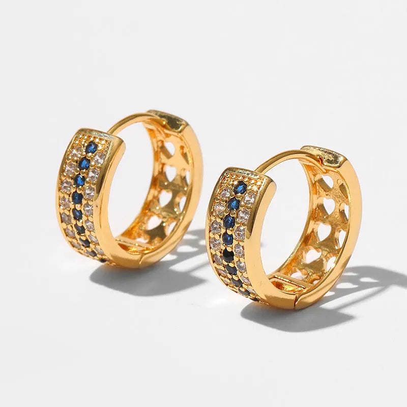 Round geometric women's earrings with 18K gold electroplated finish on copper base metal