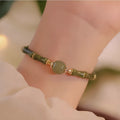 Geometric circular Hetian jade bracelet for women in dark green and light colour options.
