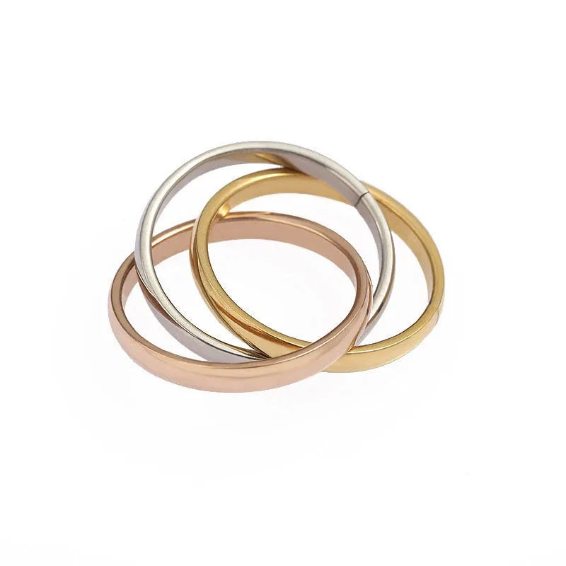 Stainless steel tricolour three-ring in gold, rose gold and silver, plain circle unisex design, sizes 5 to 10