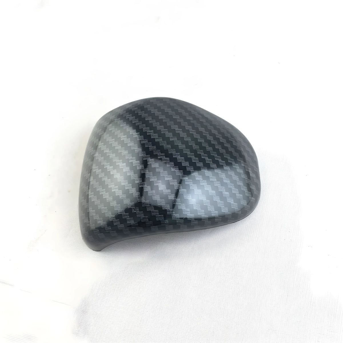 Car gear shift cover with carbon fibre pattern finish