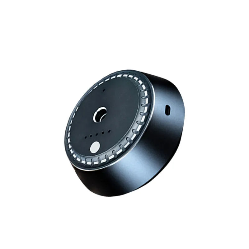 Black metal car aroma diffuser measuring 9x4.5cm with ultrasonic atomizer technology