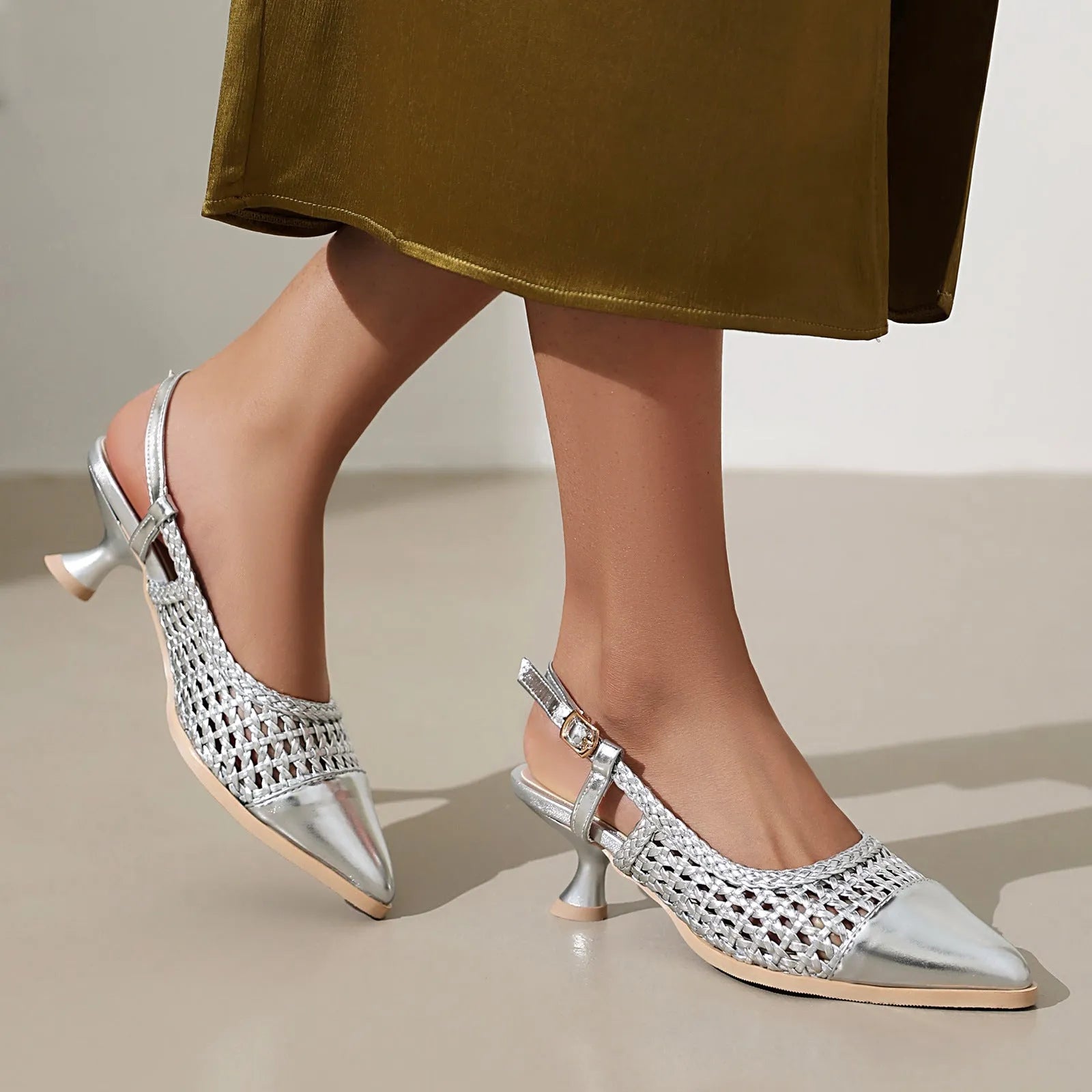 Professional women's cat heel sandals with a buckle fasten in black, gold, or silver.