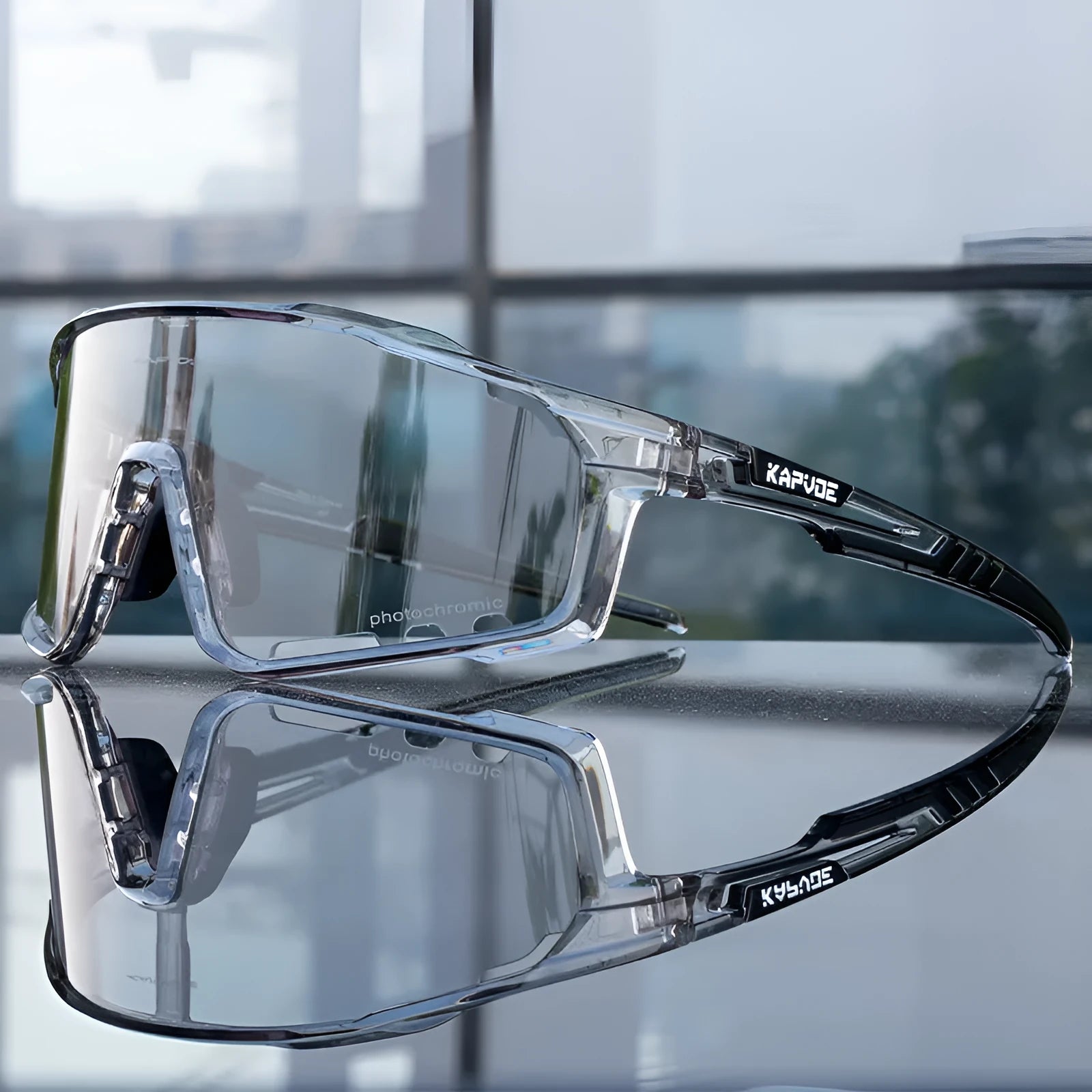 Photochromic cycling sunglasses with semi-rimless TR90 frame on a solid colour background