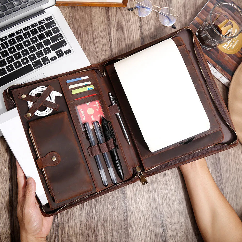 Genuine leather cowhide laptop protective case in brown with stitching and zipper closure
