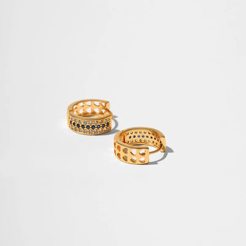 Round geometric women's earrings with 18K gold electroplated finish on copper base metal