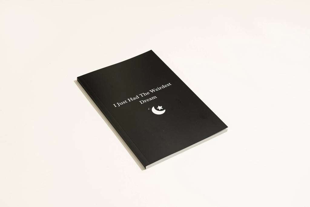 Black softcover dream journal notebook with business simplicity design for recording nightly dreams