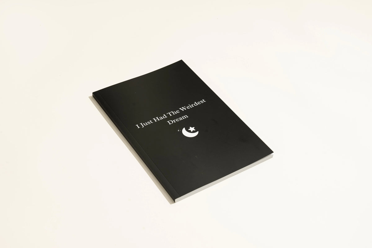 Black softcover dream journal notebook with business simplicity design for recording nightly dreams