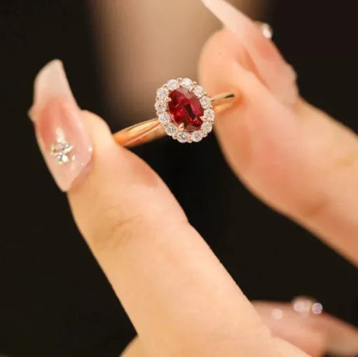 Sterling silver ladies ring with gold pigeon design and red blood ruby gemstone