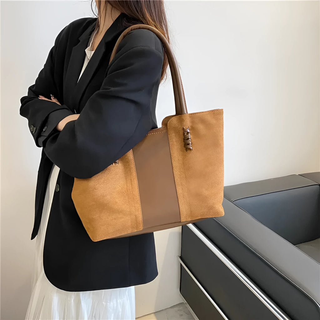 Women's large nylon tote bag in black with detachable shoulder strap, polyester lining, phone and document pockets