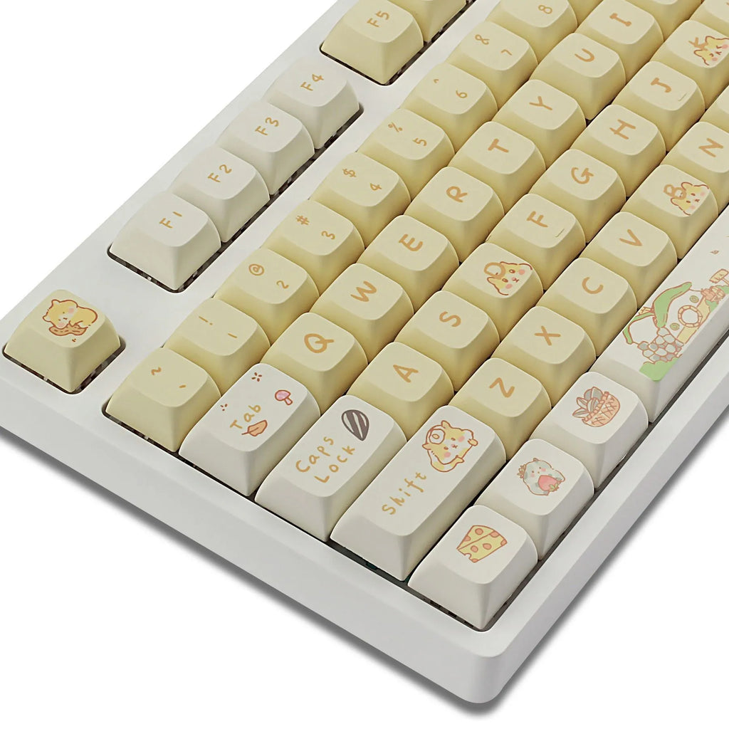 XDA profile mechanical keyboard keycaps in custard colour palette with grey and yellow accents