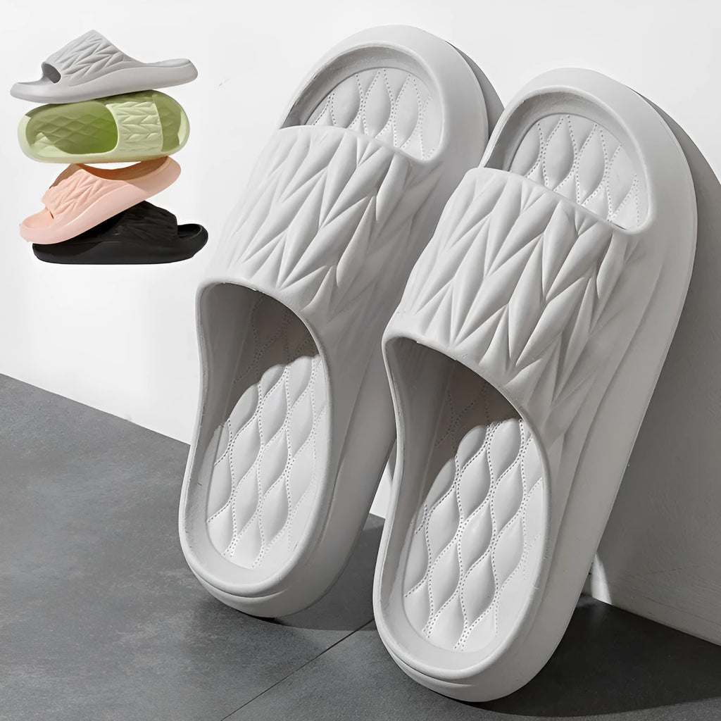 Leaf texture design EVA slippers for indoor summer wear, shown in assorted colours.