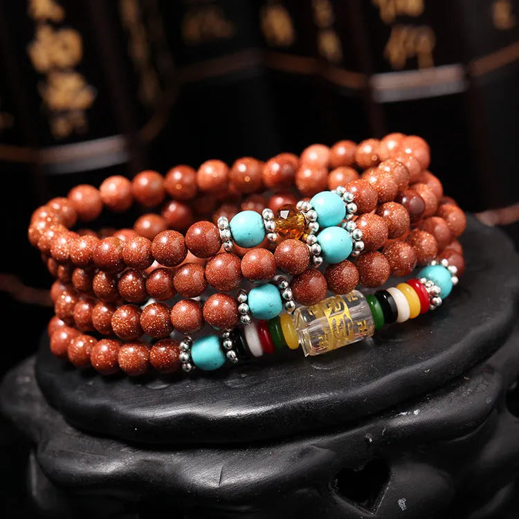 Golden star stone Six Words Mantra bracelet with 108 nugget sand beads and fu character charms