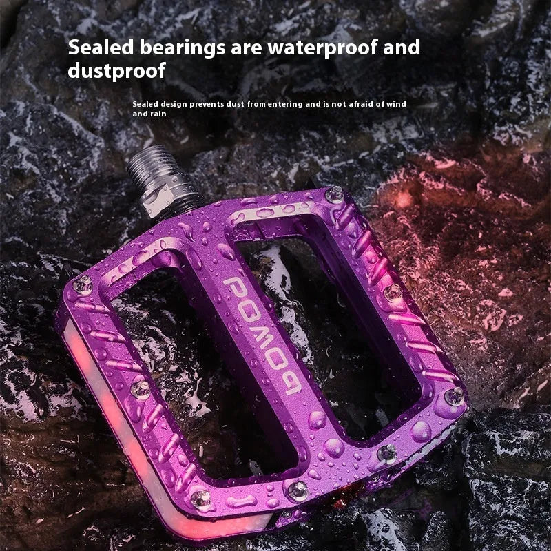 Aluminium alloy bicycle pedals with 710LED lighting in black, gold, purple, red, and titanium colour options