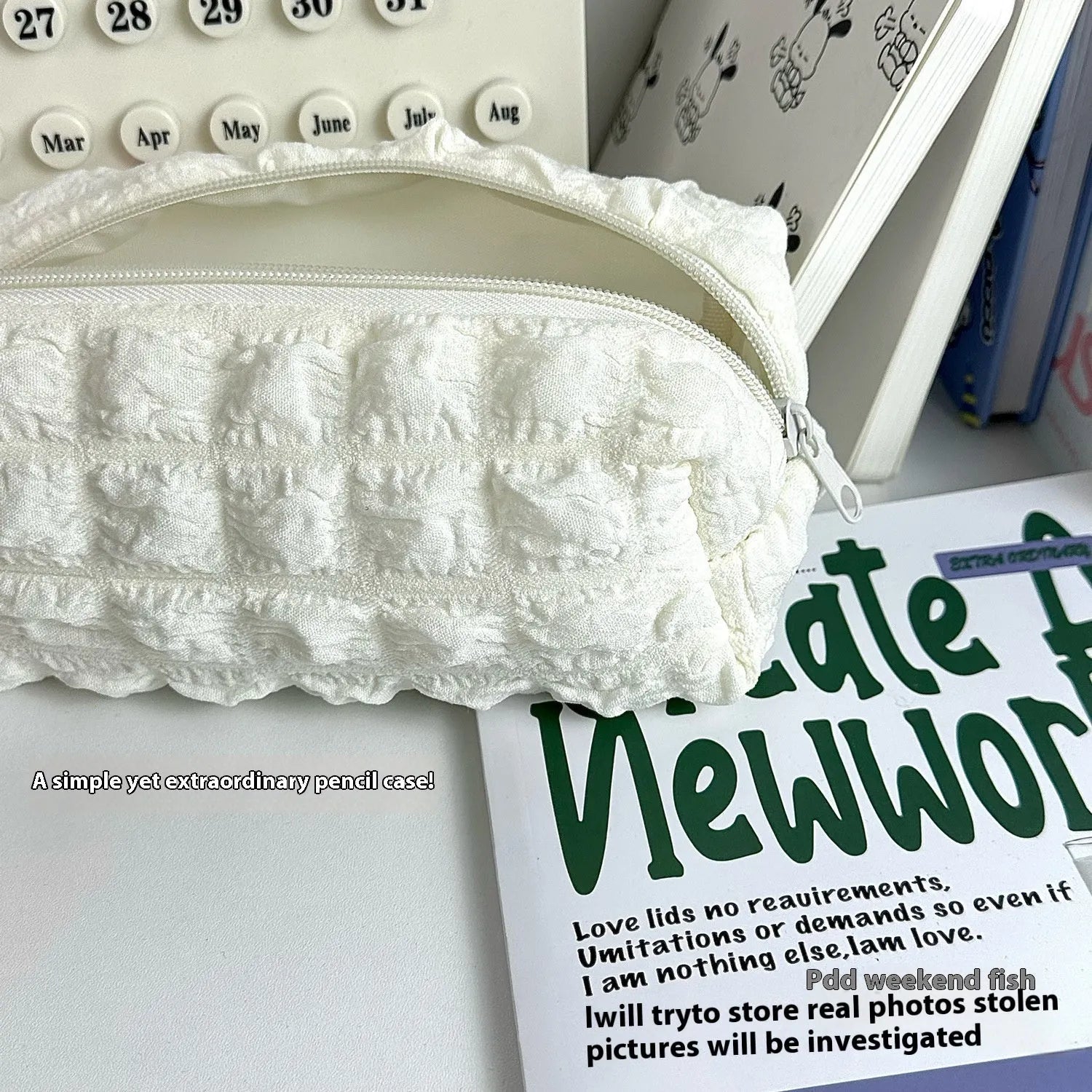 Cream puff style fabric pencil case in beige or black colour made from polyester material