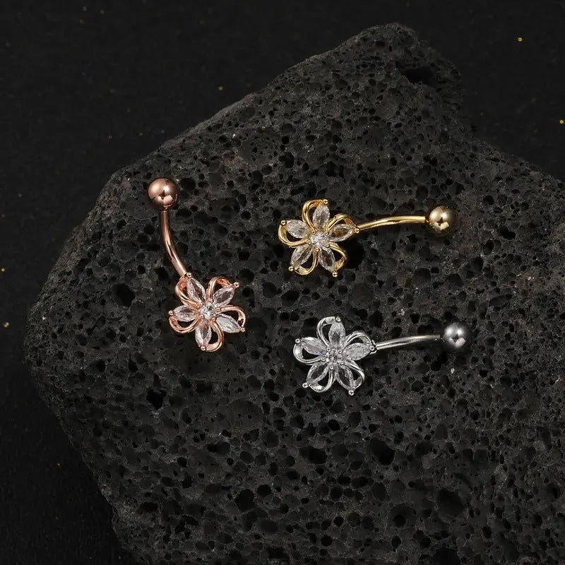 Copper navel stud with zircon flower design in electroplated gold finish
