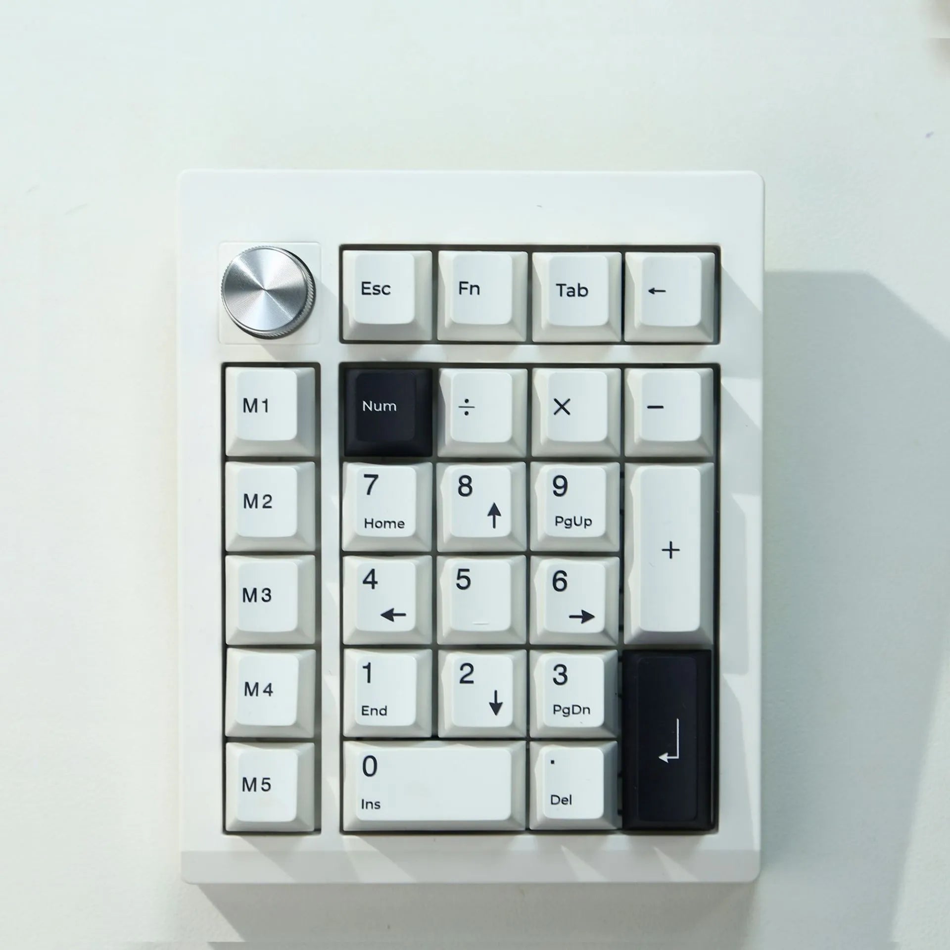 Wireless mechanical numeric keyboard in black and white colour options with Bluetooth connectivity