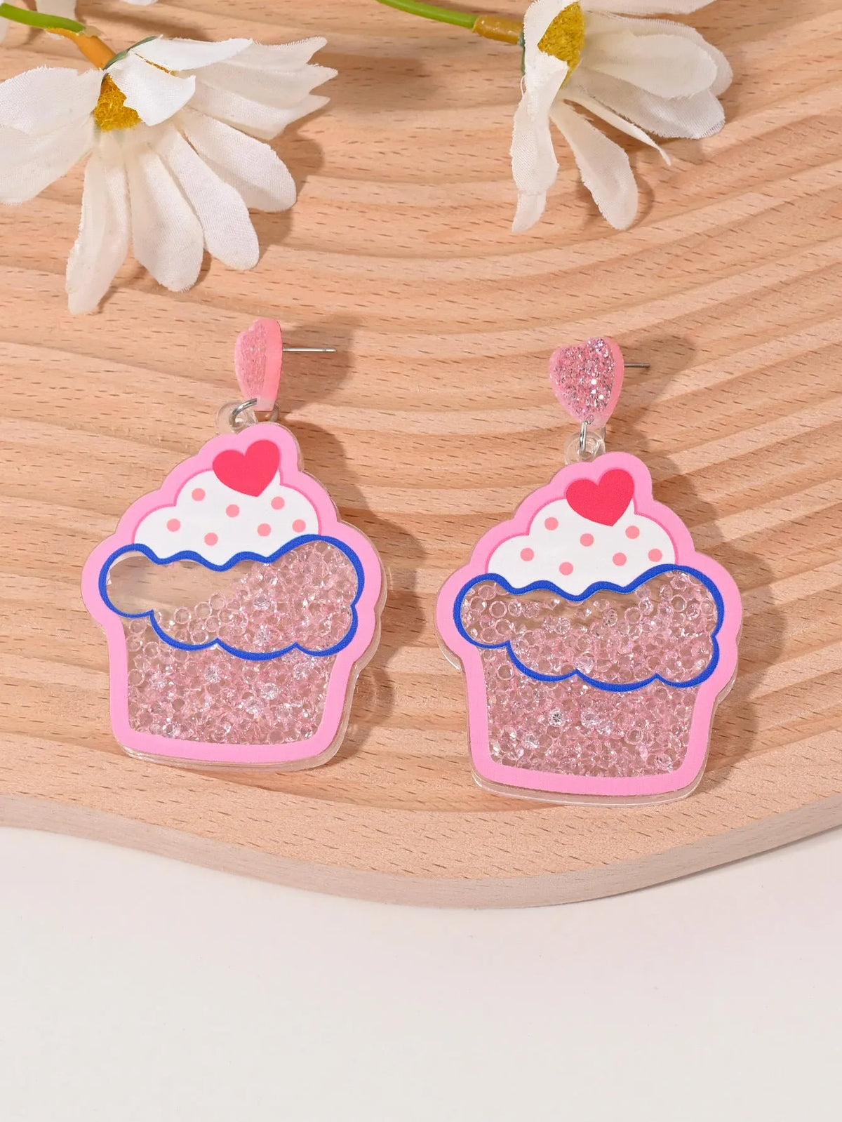 Set of acrylic earrings shaped like cherry, strawberry, watermelon, pineapple, coconut, cake, and ice cream.