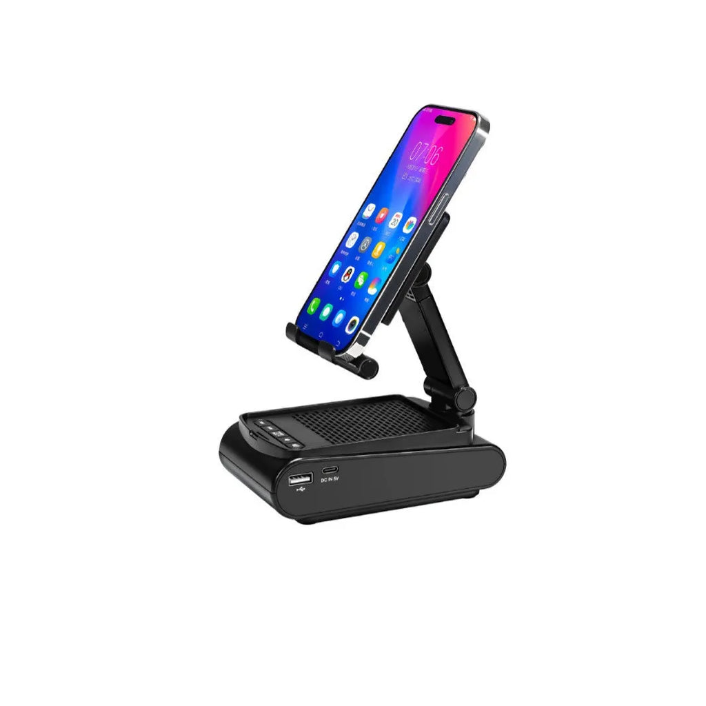 Multi-function lazy phone holder with Bluetooth audio in black plastic on a desk showing a smartphone in landscape mode