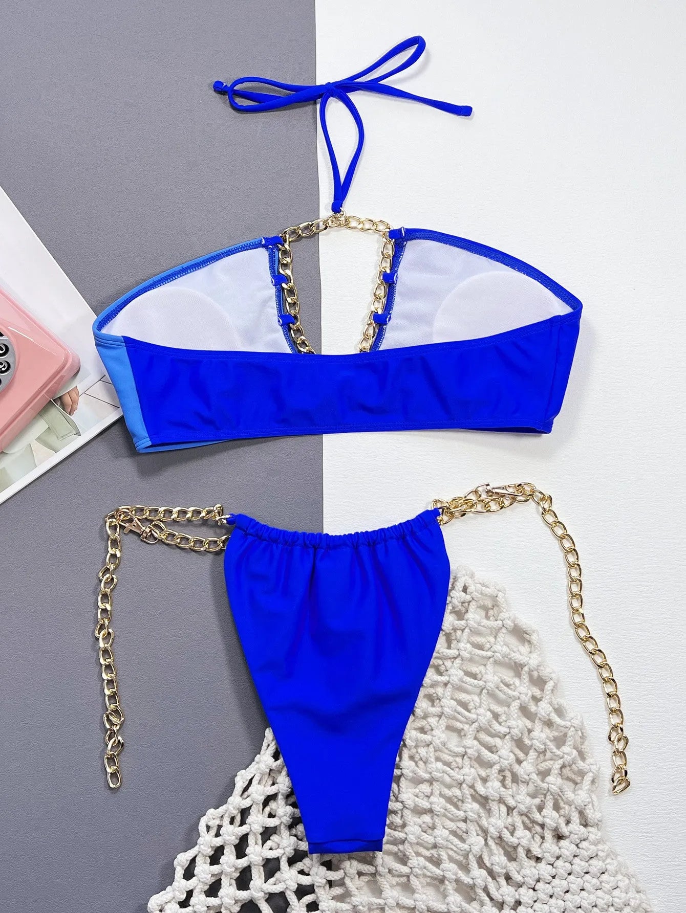 Solid blue women's bikini swimsuit set with top and bottom pieces