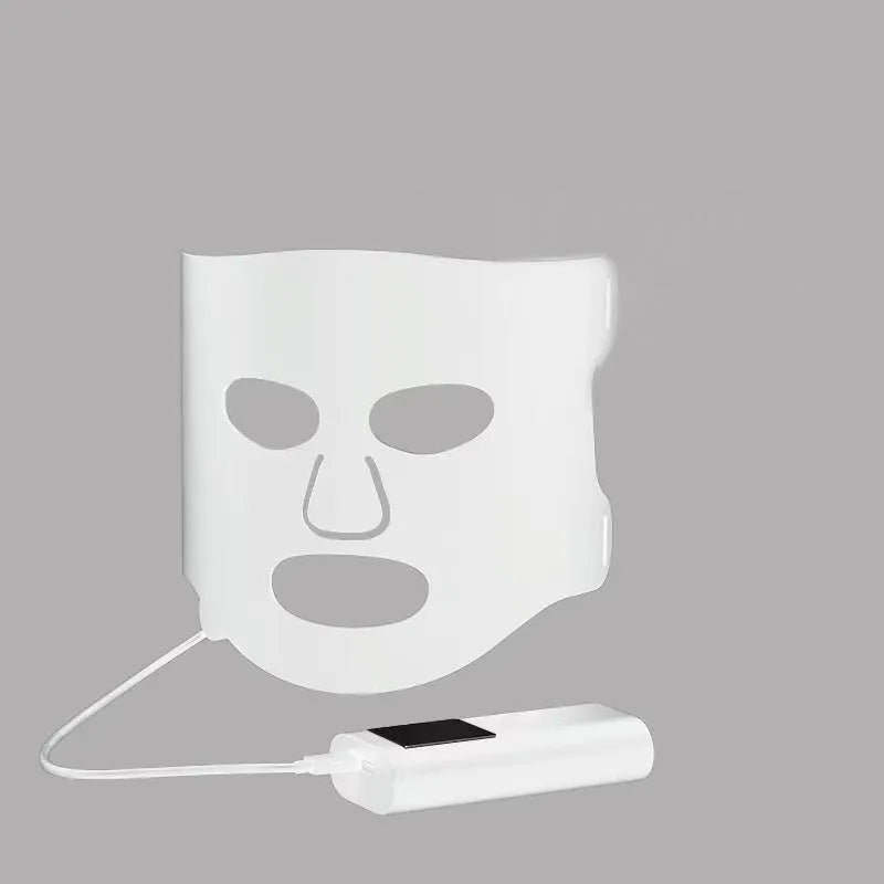 Black gold LED phototherapy face mask with controller showing seven colour light modes for skin treatment