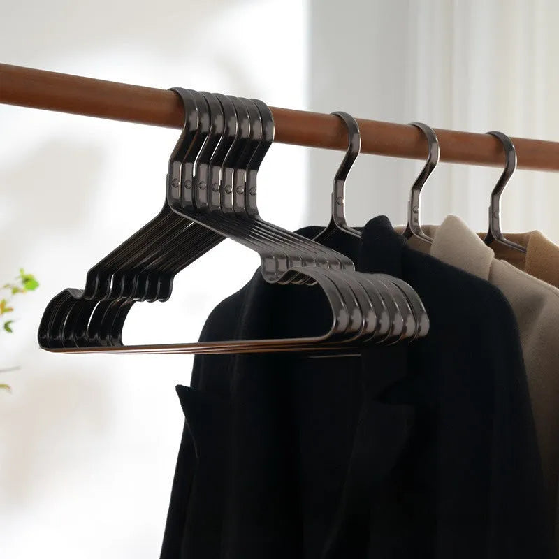 Elegant black modern clothes hanger with anti-slip, anti-rust, and anti-fade features.