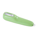 Green kitchen peeler with stainless steel blade stored inside a clear plastic tube.
