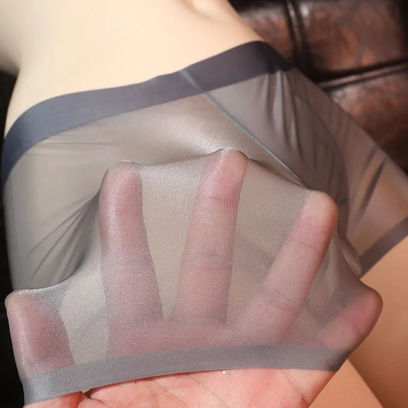 Men's ultra-thin transparent boxer underwear in six colour options showing lightweight nylon construction