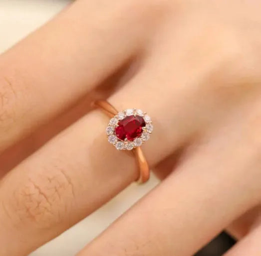 Sterling silver ladies ring with gold pigeon design and red blood ruby gemstone