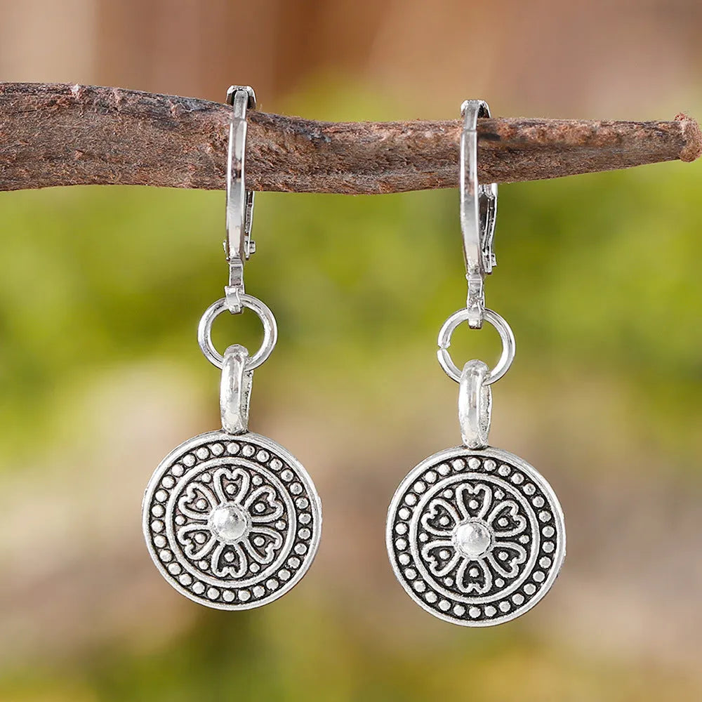 Bohemian retro geometric earrings with distressed ethnic detailing and round print design in zinc alloy
