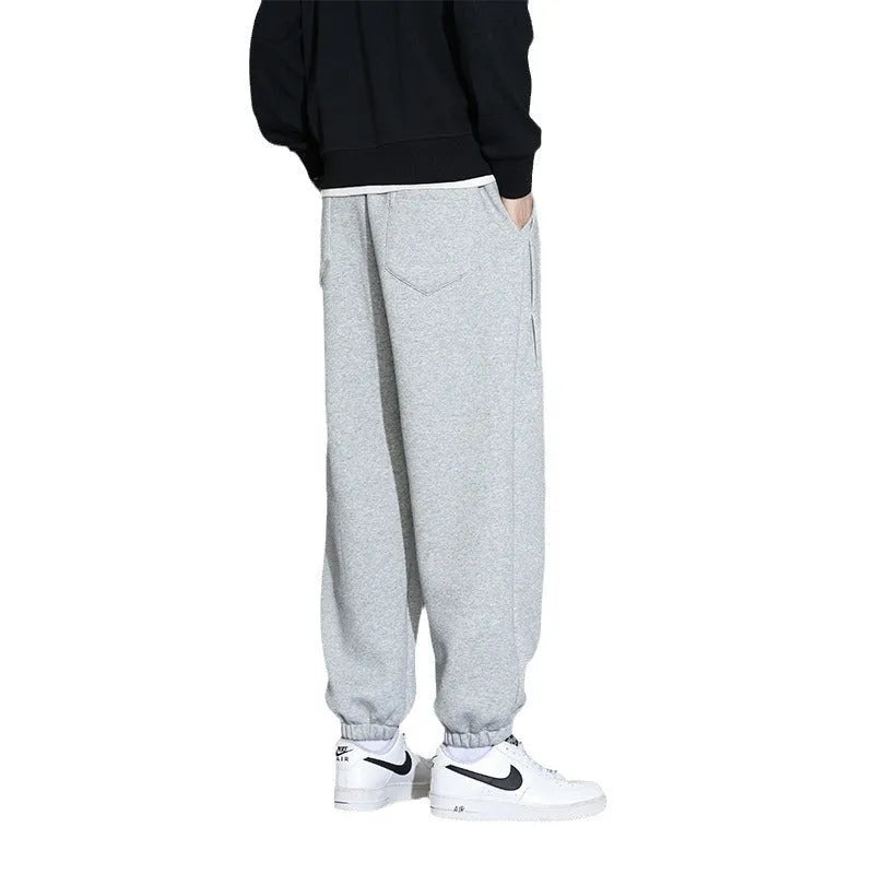 Men's loose casual sports trousers in grey, black, or army green, sizes M-8XL, cotton polyester, mid waist drawstring.