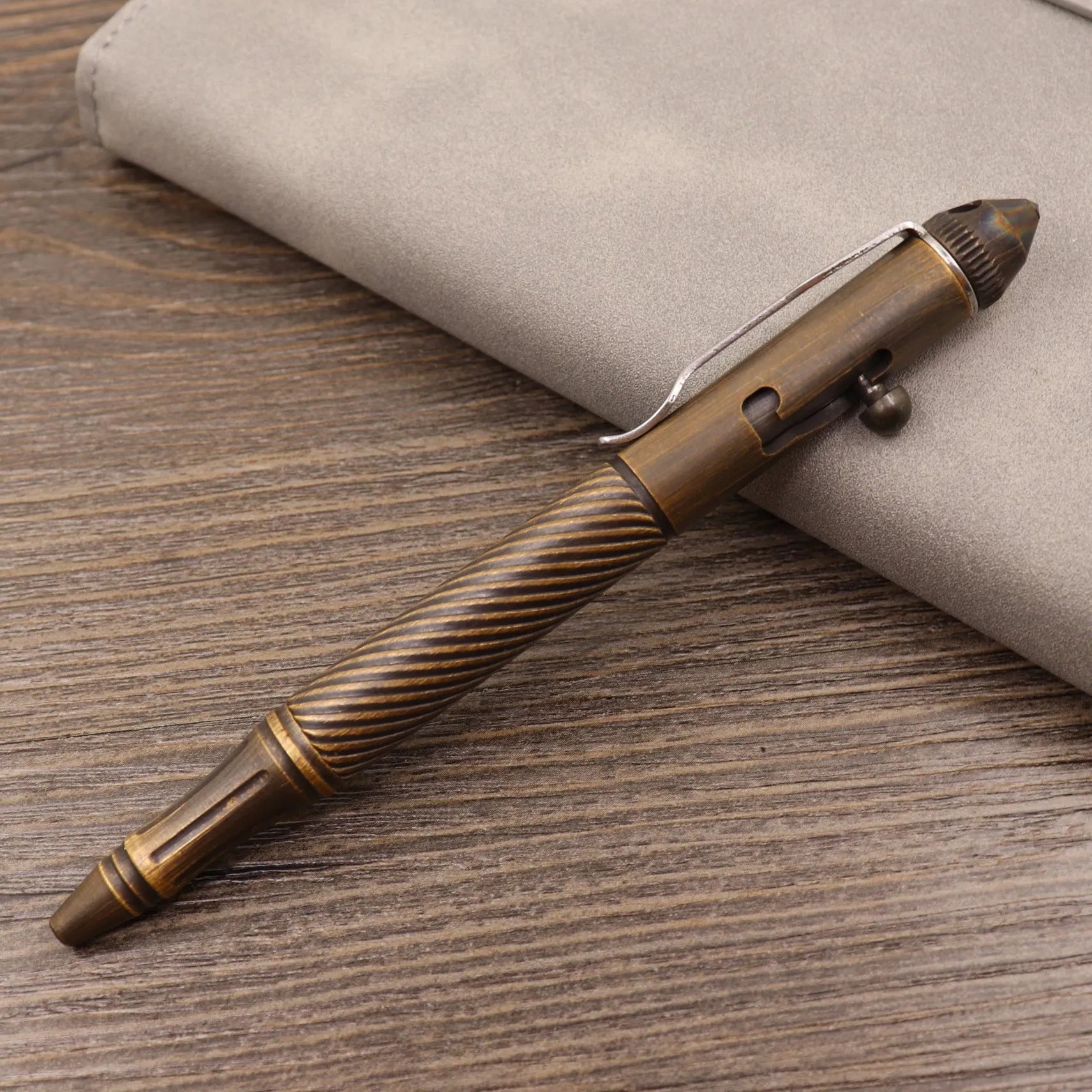 Brass tactical pen with retro colour and bolt-action press mechanism