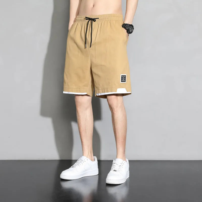Cotton shorts for boys in plus sizes, showing mid waist and short length design in khaki colour.