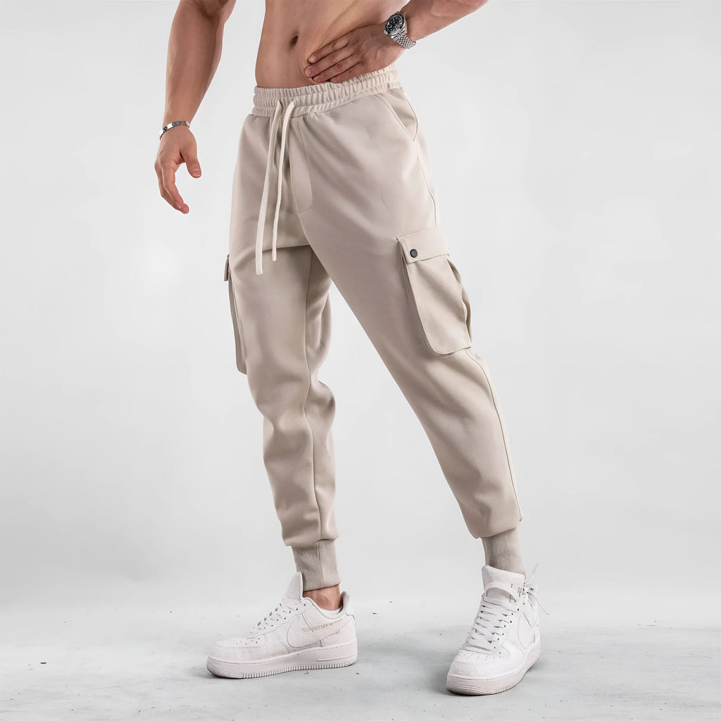 Men's loose cotton sports trousers with ankle ties and multiple pockets in various colours
