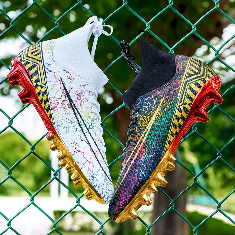 High-top soccer training shoes with gold bottom detail on artificial grass surface