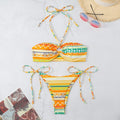 Women's halter bikini swimsuit with split cup design and adjustable tie back in green stripe pattern