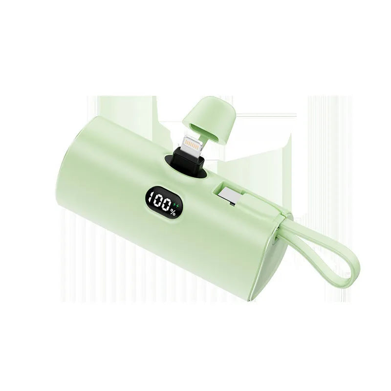 Capsule digital display wireless pocket power bank showing five colour options with integrated plug