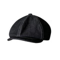 Black Japanese denim beret shown in unisex retro style with adult sizing options