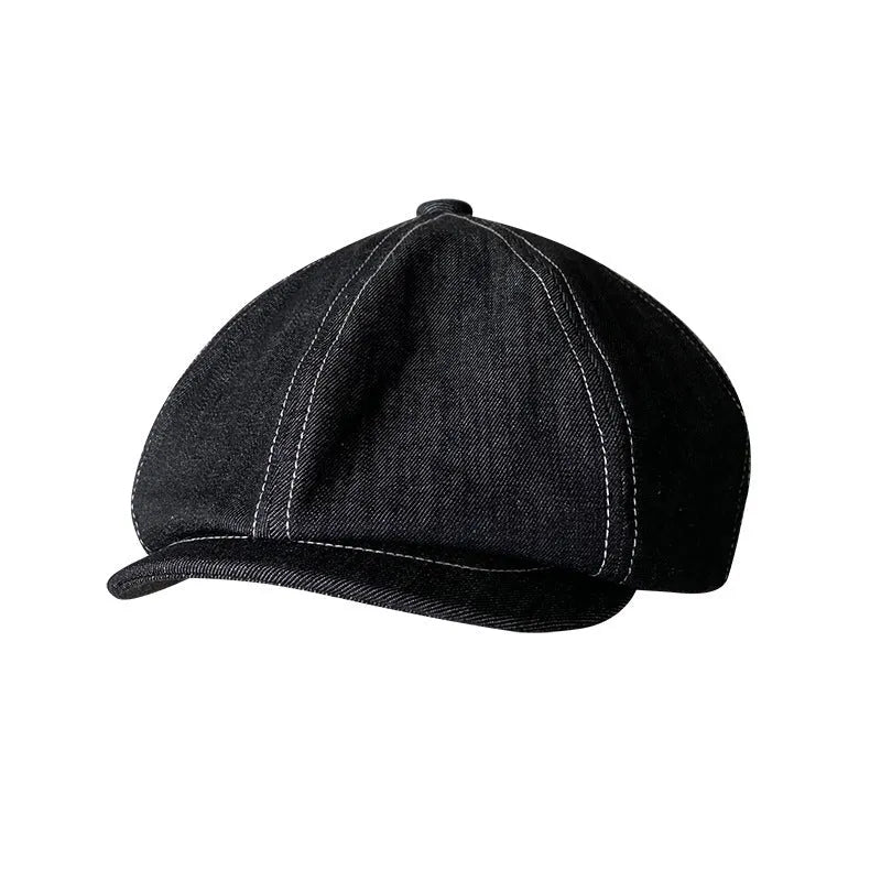 Black Japanese denim beret shown in unisex retro style with adult sizing options